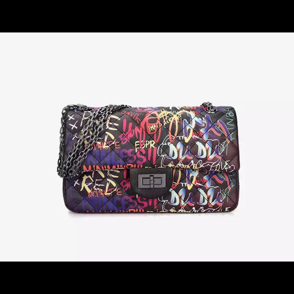 Dark colored quilted graffiti handbag!